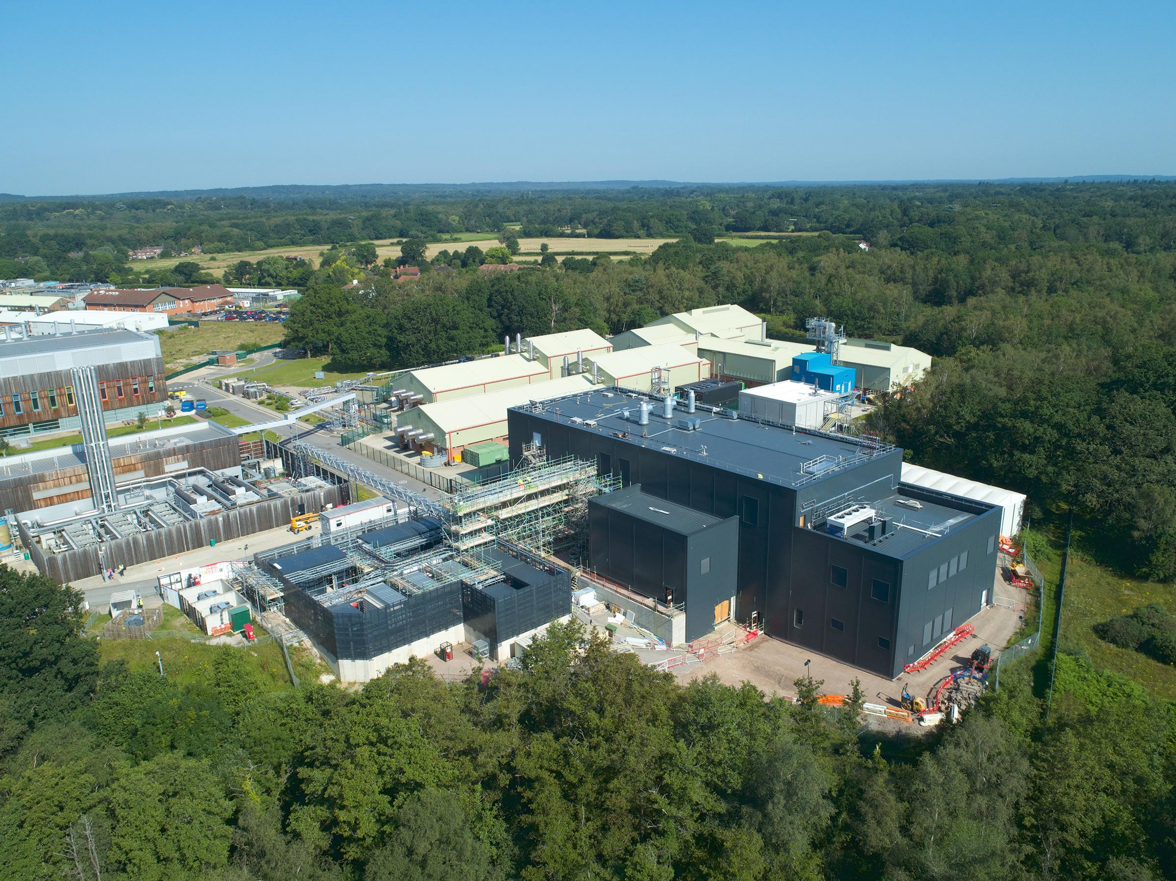 Aerial shot of The Brooksby Building surrounded by woodland and The Pirbright Institute site