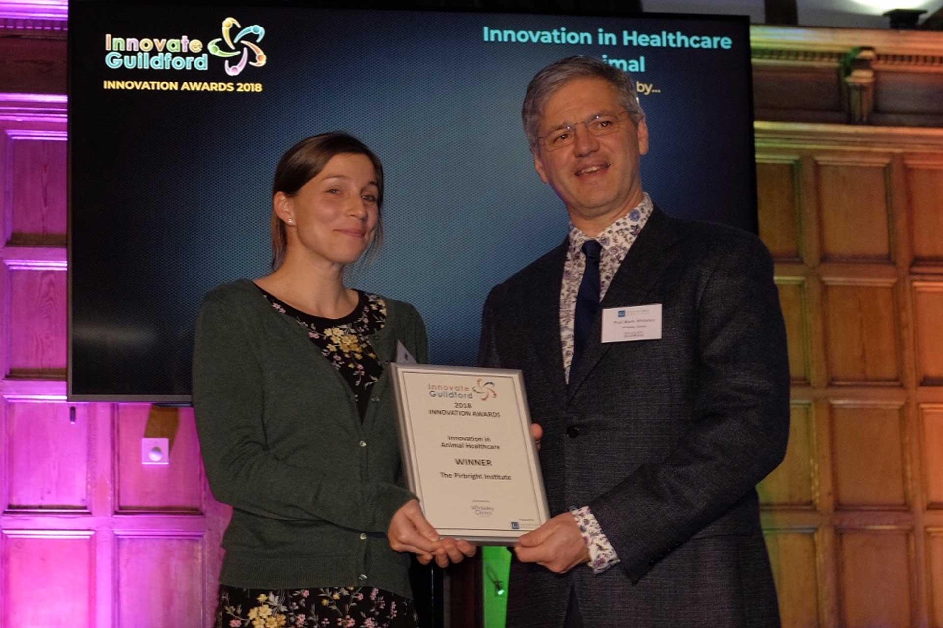 Claire colenutt receiving innovation in animal healthcare award