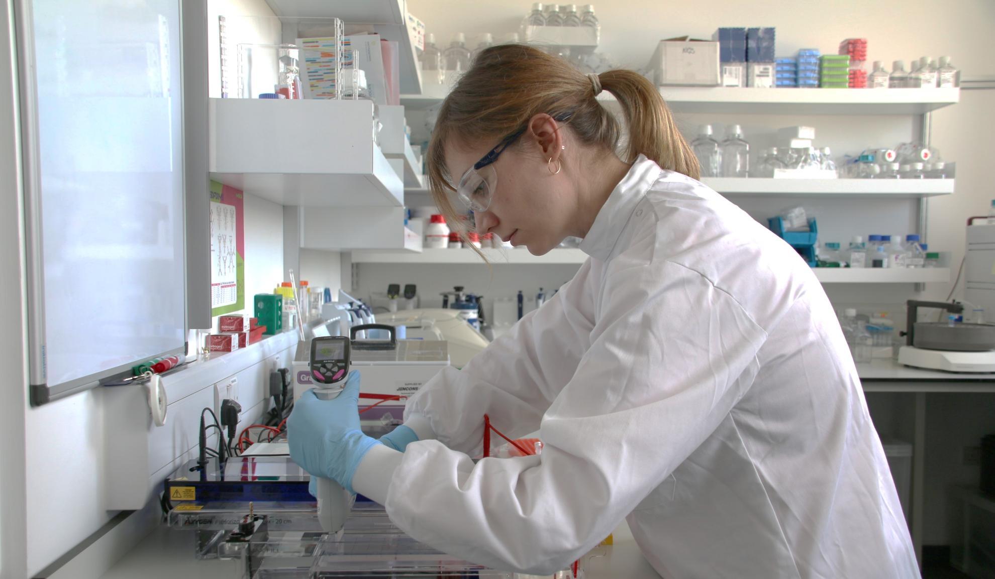 Scientist in a white lab coat 